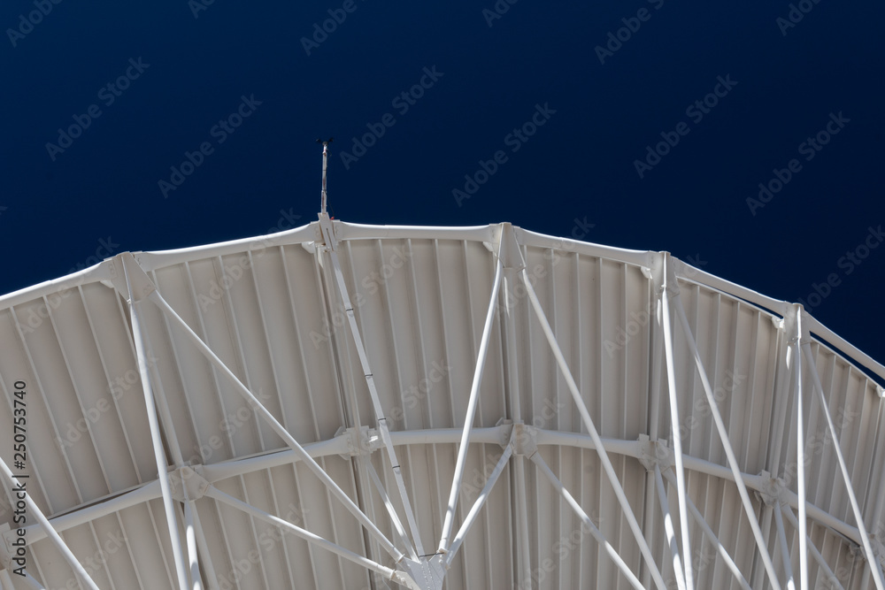 Wall mural very large array structure under a large radio telescope antenna dish at the vla in new mexico, hori