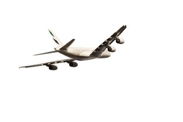 An airplane cropped on a neutral background