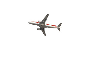 An airplane cropped on a neutral background