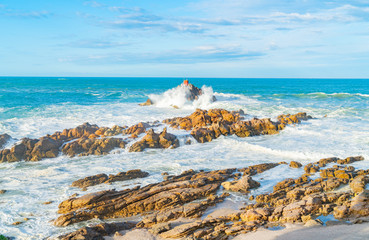 Storm waves crashing into rocky foreshore