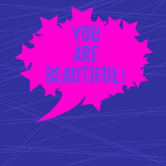 Text sign showing You Are Beautiful. Conceptual photo telling girl that she has good looking from outside Blank Oval Color Speech Bubble with Stars as Outline photo Text Space