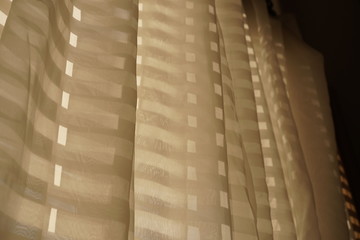 Curtains with Sunlight Shining Through.