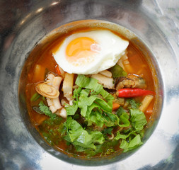 Sour soup with seafood shrimp squid / Hot soup fish mussel egg and lettuce vegetable