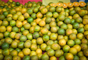 Fresh orange fruit texture background for sale in the market - Asia orange organic tropical fruit