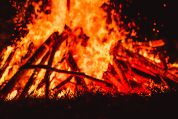 big flames on field during fire