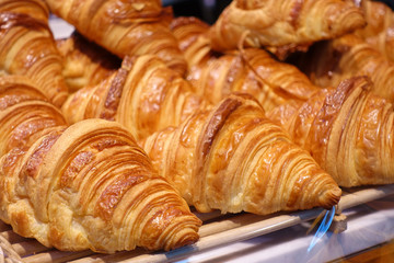 All french style breads croissant selling in the market in Paris, France. 