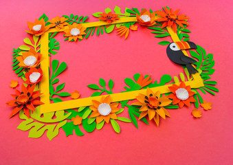 Decorative Arrangement of tropical leaves and flowers. Handmade workshop. Frame