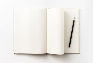 Business concept - Top view collection of  light yellow fabric notebook, pen, flip curl rolled page and white open page isolated on background for mockup