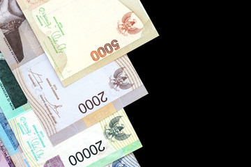 Indonesian rupiah on dark background close up
