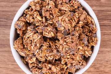 Oat flakes with chocolate as source iron and fiber, healthy snack concept