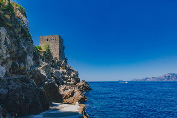 Watch tower by water near the town of Praiano, along the Amalfi Coast, Italy