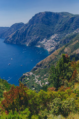 Fototapeta na wymiar Mountains and coastline of Amalfi Coast from Path of the Gods, a hiking trail near Positano, Italy