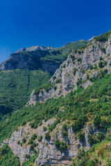 Fototapeta na wymiar Mountains and cliffs of Amalfi Coast from Path of the Gods, near Positano, Italy