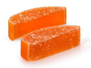 Two marmalade orange slices on a white background