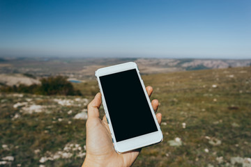 woman using mobile smart phone outdoor