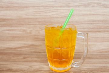 chrysanthemum tea fresh drink with ice put on wood floor and wood background