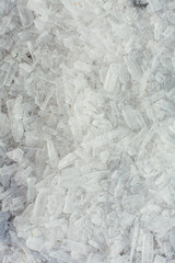 Amazing abstract broken ice crystals texture. Clear melting ice background.