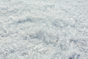 Amazing abstract broken ice crystals texture. Clear melting ice background.