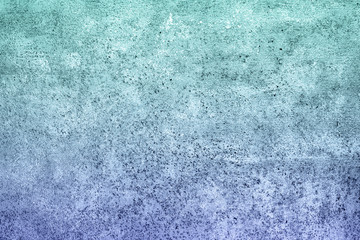 Turquoise violet gradient concrete plaster background with small spots