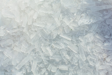 Obraz premium Amazing abstract broken ice crystals texture. Clear melting ice background.
