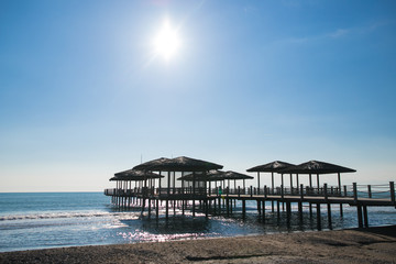 ruined pier on the beach