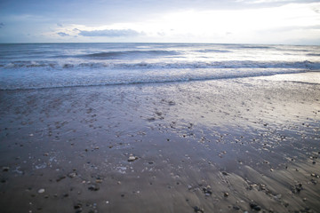 Gloomy outdoor landscape view from seaside with overcast sky clouds