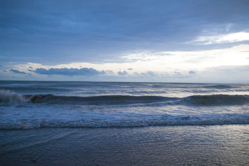 Gloomy outdoor landscape view from seaside with overcast sky clouds