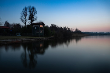 Sunset on a lake with beautiful reflection in the water