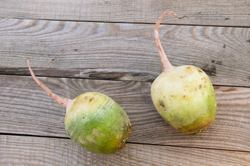 Whole chinese  radish on rustic wooden table