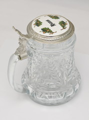 A traditional German beer mug with silver lid,with Hans name on it