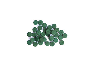 Supplement, spirulina tablets top view.