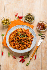 tempeh with tomatoes capers and green olives