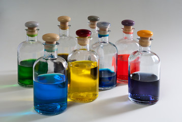 Bottles with colored liquid