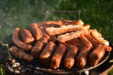 barbecue grill in Romania,, spicy sausages and bacon.mici,mititei