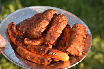 traditional romanian barbecue raw meat ,mici, mititei,(cevapcici), pork meat rolls