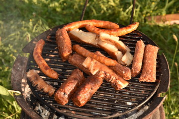 barbecue in Romania,, spicy sausages and bacon