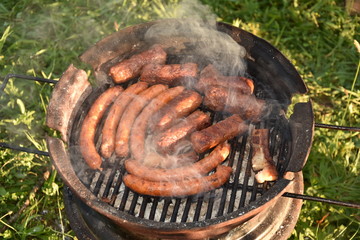  barbecue in Romania,, spicy sausages and bacon