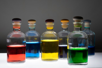 Bottles with colored liquid