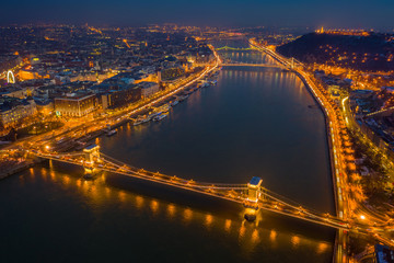 Fototapeta na wymiar Budapest, Hungary - Aerial view at blue hour of Szechenyi Chain Bridge, Elisabeth Bridge and Statue of Liberty at winter time