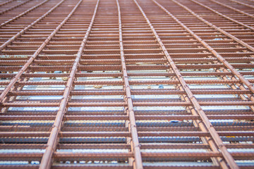 Rusty steel deformed bars for reinforcement concrete background. Rusty steel Re-bar steel or deformed bar material for building construction.