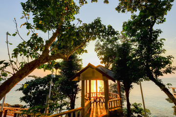 Dining tables of a resort restaurant on a tropical Perhentian Island, Malaysia.