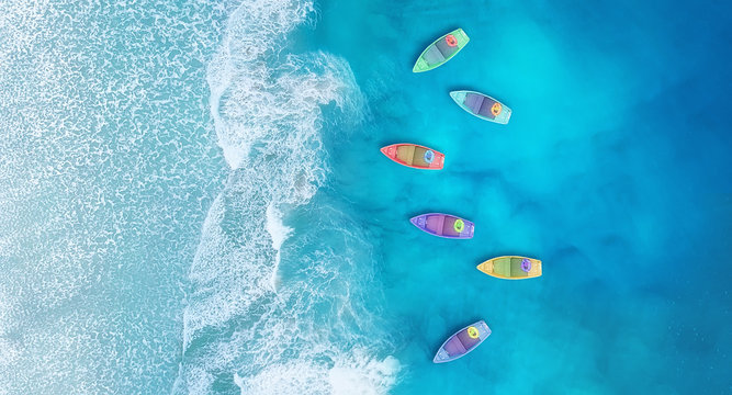 Boats from air. Aerial view on sea in Turkey. Summer seascape with clear water in sunny day. Top view of boats from drone. Summer seascape from air. Travel - image