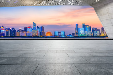 Empty square floor and beautiful city night view in Hangzhou