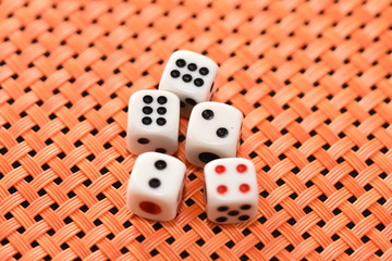 dices on orange background