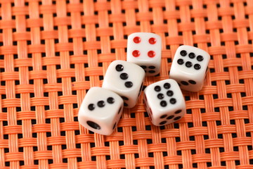 dices on orange background