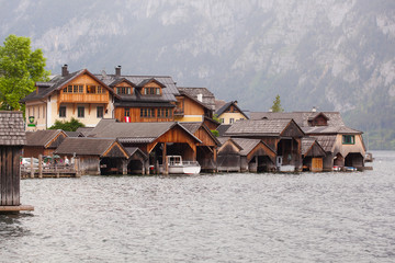 Fototapeta premium Garages for boats at lake in the Austrian city of Halltatt