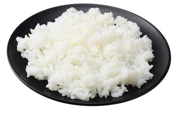 White rice in black bowl isolated on white background