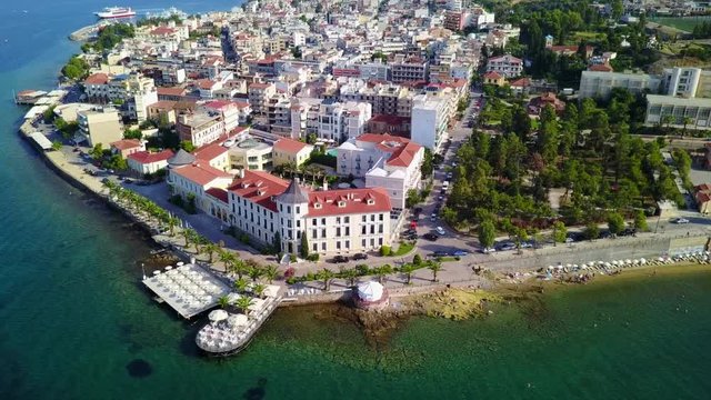 Aerial birds eye view video taken by drone of picturesque village of Aidipsos known for hot springs, North Evoia, Greece