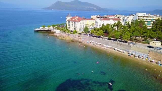 Aerial birds eye view video taken by drone of picturesque village of Aidipsos known for hot springs, North Evoia, Greece