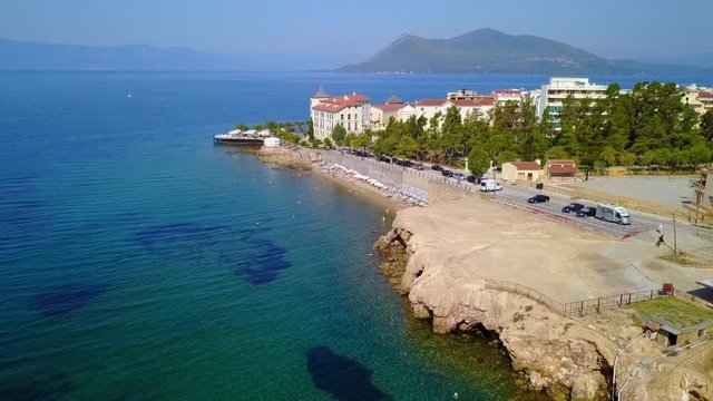 Aerial birds eye view video taken by drone of picturesque village of Aidipsos known for hot springs, North Evoia, Greece